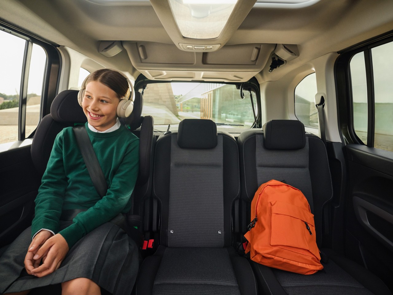 A child relaxes in the back of the Proace City Verso 